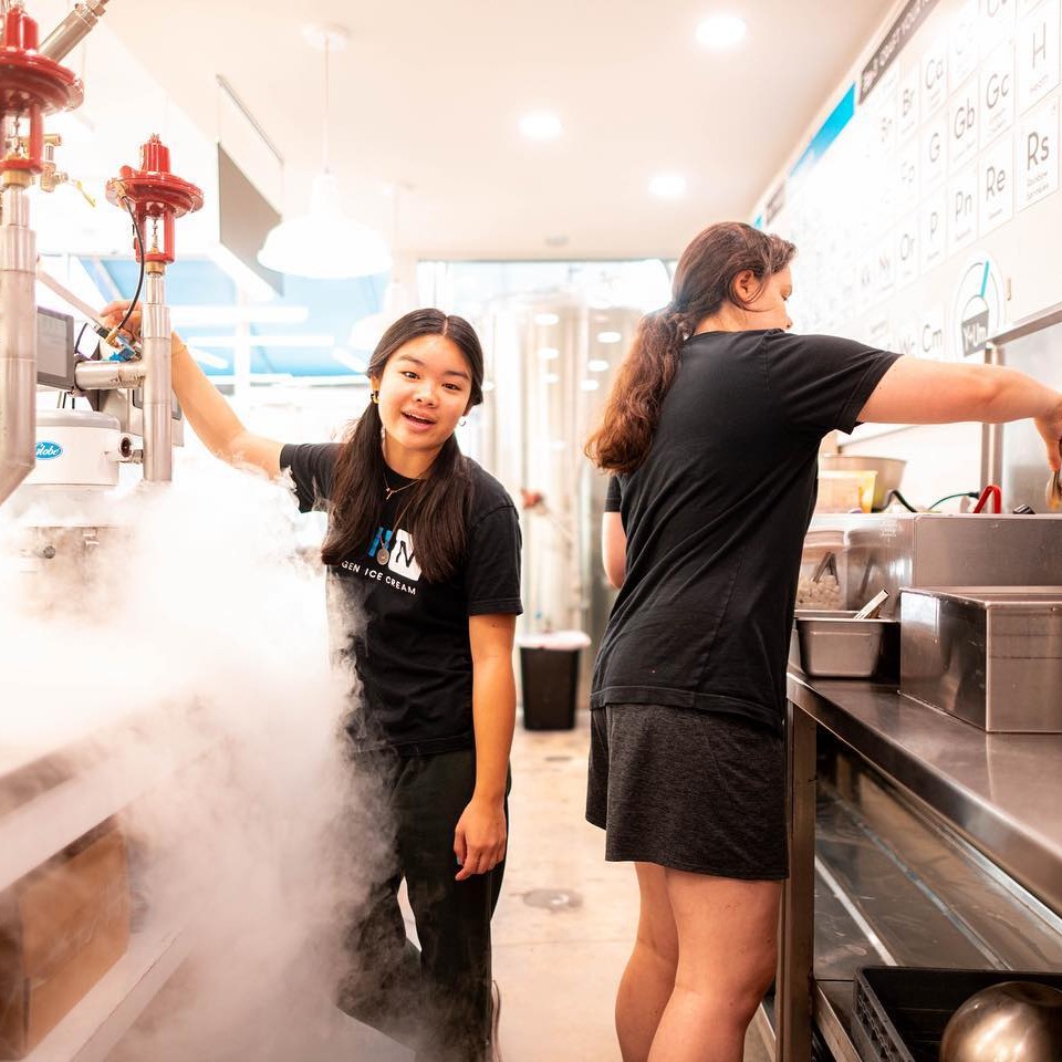 Chill-N staff members freezing ice cream in nitrogen chambers